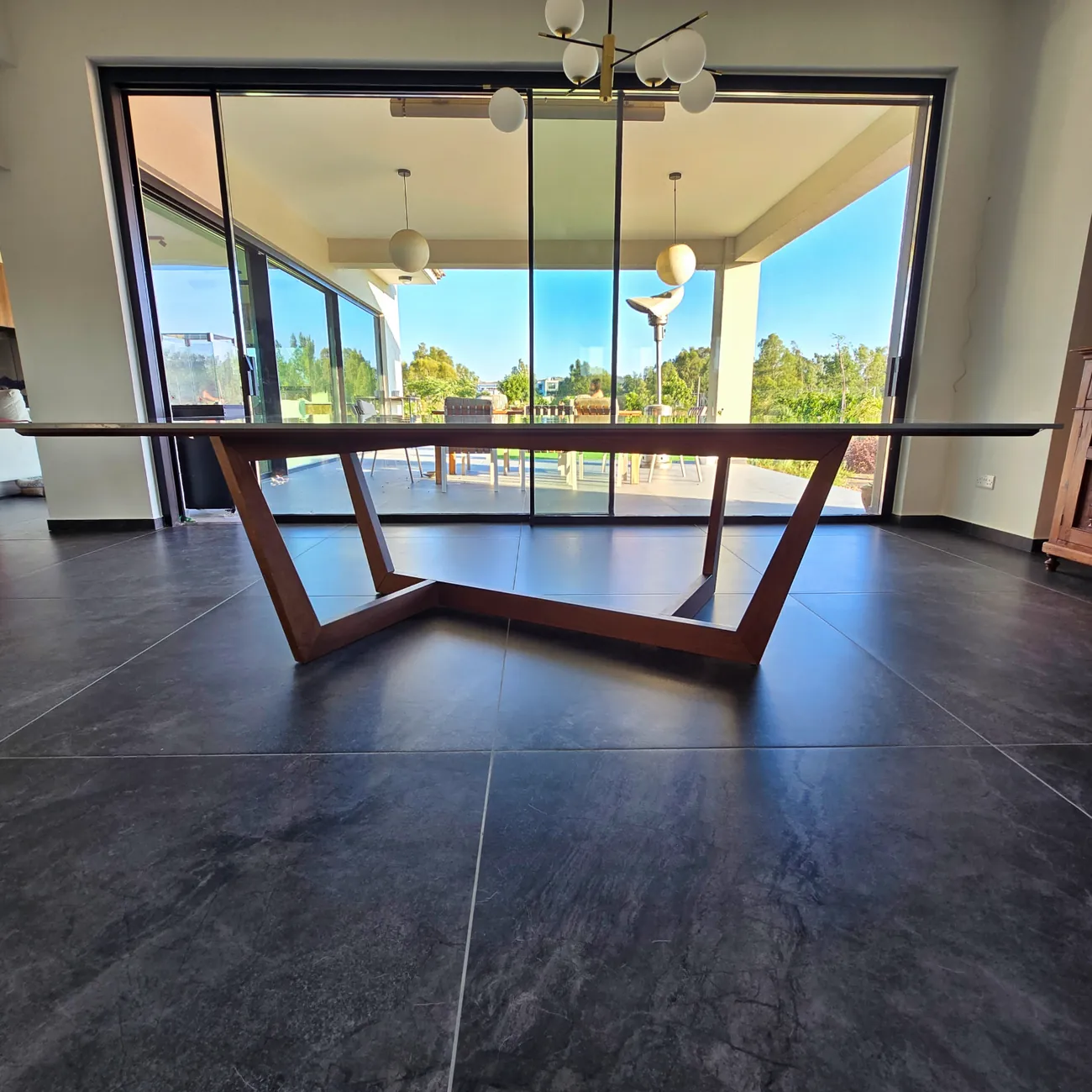 Dining table — chevron base